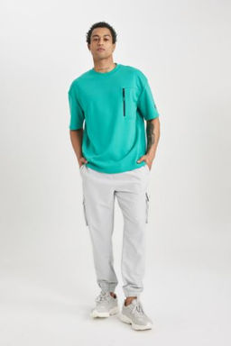 DeFactoFit Sporcu Jogger Esofman Alt? Standart Fit Kargo Cepli Dokuma Beli Pacas? Lastikli