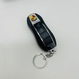 Брелок Ключ от машины 3 в 1 фонарик, лазер, электрошокер 24 шт в уп - Storyland фото 5