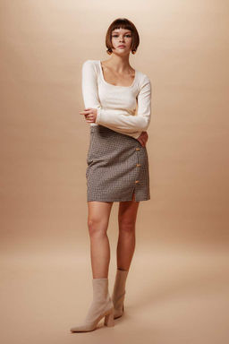 Мини-юбка А-силуэта в клетку на подкладке