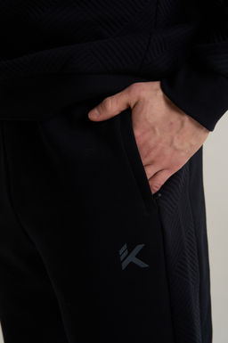 Брюки трикотажные Черный KT Knit Track Pants - Anta фото 9