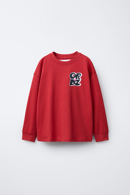 T-SHIRT WITH RAISED SLOGAN PRINT