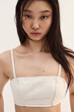 Crop top de sarga con efecto desgastado