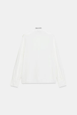 RUFFLED BLOUSE WITH CONTRAST BOW