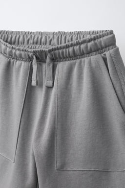 CONJUNTO CAMISETA Y BERMUDA INTERLOCK / Gris vigor?