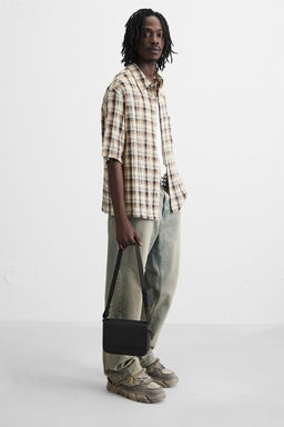 RUBBERISED TEXTURED CROSSBODY BAG - Zara фото 2