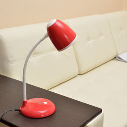 TLI-228 RED E27 Светильник настольный, 60W. Цоколь Е27. Механический выключатель. Красный. ТМ Uniel.