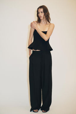 STRETCH PEPLUM TOP