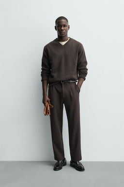PLEATED TEXTURED TROUSERS
