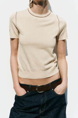 SHORT SLEEVE KNIT TOP WITH PIPING