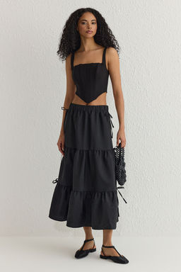 TRENDYOLMILLA Siyah Parasut Kumas Kurdele Detayl? A-line Maxi Boy Dokuma Etek TWOSS25ET00033