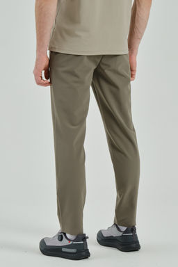 Брюки текстильные Темно-зеленый - Anta фото 6