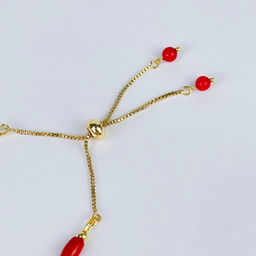 Браслет регулируемый на увеличение из Коралла от 16 см