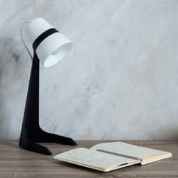 ULO-K22 D/E14/A BLACK/WHITE Светильник настольный, 40W. Цоколь E14. Механический выключатель. Черный с белым. ТМ Uniel