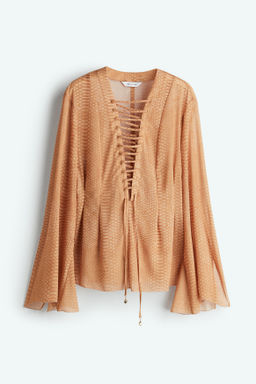Blusa de gasa con lazada
