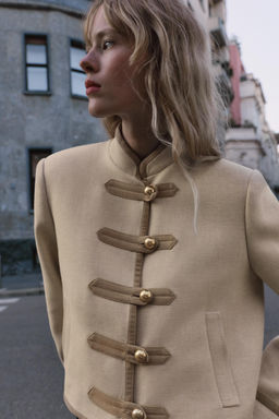 TOGGLE SHOULDER PAD JACKET