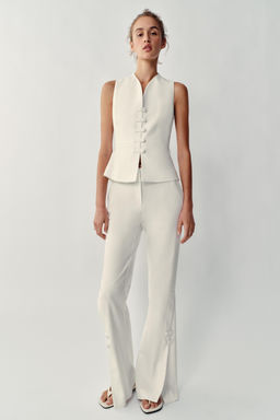 CHALECO PEPLUM / Crudo