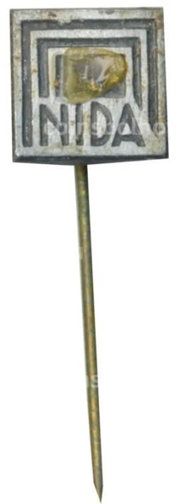 Значок рекламный NIDA