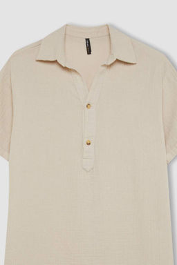 Базовое простое муслиновое мини-платье стандартного кроя с воротником-поло на пуговицах и короткими рукавами - Defacto фото 2