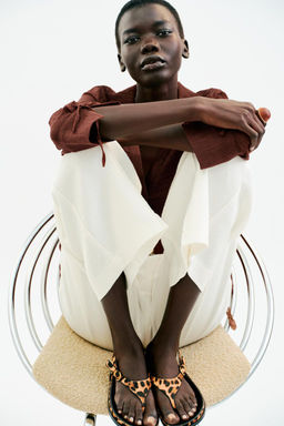 ANIMAL PRINT LEATHER AND SHEEPSKIN SANDALS