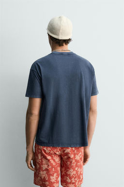 CAMISETA TEXTO EFECTO LAVADO / Azul