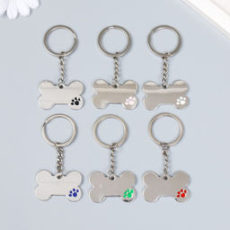 Цена за 12 шт. Брелок для ключей на кольце «Косточка с лапкой», металл, 3×4 см, МИКС