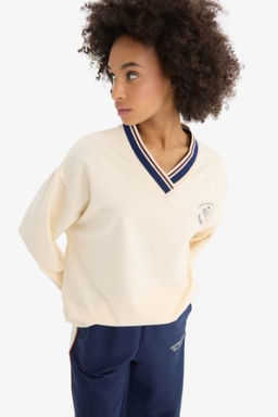 DeFactoFit Oversize Genis Kal?p V Yaka Bask?l? Sporcu Sweatshirt
