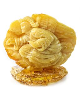 Резная декоративная статуэтка из цельного натурального медового янтаря Ангел