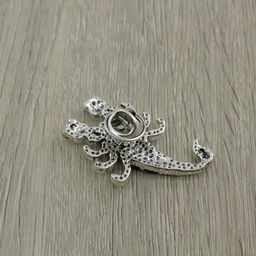 Брошь "Скорпион" гелиотис