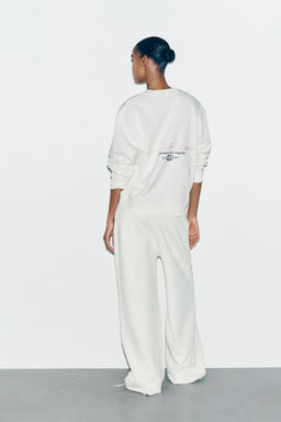 COTTON EMBROIDERED TEXT TROUSERS - Zara фото 5