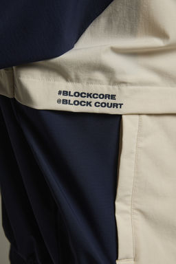 Ветровка с капюшоном Темно-синий/Бежевый - Anta фото 11