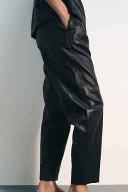 FAUX LEATHER TROUSERS