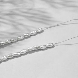 Бусины пластиковые на нити «Жемчуг» рис 0,7×0,5×0,5 см, (набор 150 шт.), цвет белый