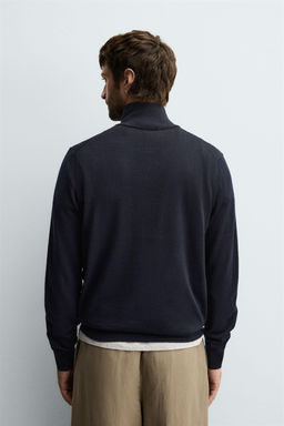 100% WOOL QUARTER-ZIP SWEATER