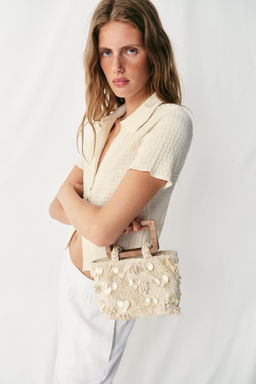 BOLSO DETALLES EFECTO NACARADO / Crudo