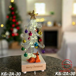 Новогодний светильник в виде елки с висящими игрушками