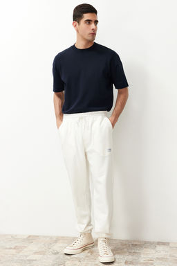 TRENDYOL MAN Ekru Regular Fit Etiket Aplikeli Cepleri Dikisli Esofman Alt? TMNSS23EA00010 - Trendyolmilla фото 17