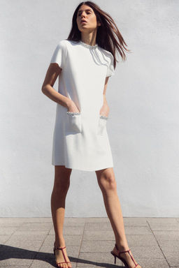 PLAIN KNIT MINI DRESS WITH RHINESTONES