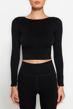 Trendyolmilla Siyah Seamless/Dikissiz S?rt ve Reflektor Bask? Detayl? Crop Orme Spor Ust/Bluz THMAW24BZ00023