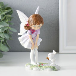 Фигурка полистоун Девочка-бабочка с зайчиком на полянке, 9.5?6?13 см