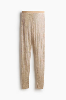 Leggings de encaje con detalles decorativos