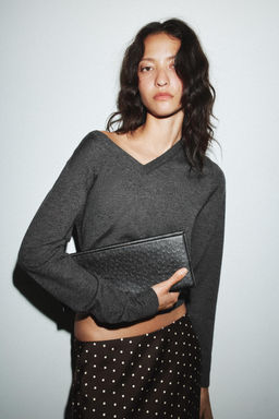 EMBOSSED LONG CLUTCH BAG