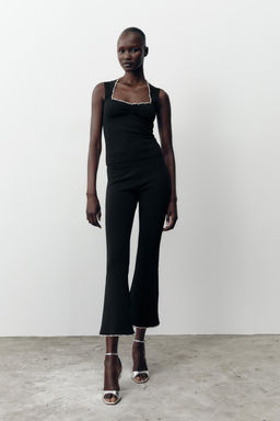 FLARE STRETCH TROUSERS WITH FAUX PEARLS