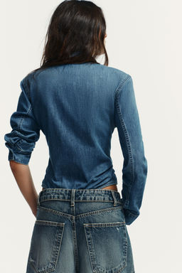 SHIRT-STYLE BODYSUIT WITH SHOULDER PADS