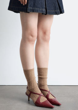 Tacones destalonados de piel con tiras cruzadas