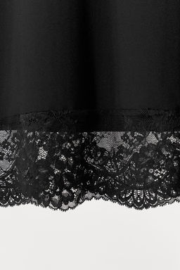 FALDA CON POLIAMIDA ENCAJE / Negro