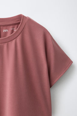 CAMISETA FLUIDA GYM CON MODAL / Rosa empolvado