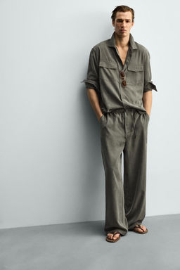PANTAL?N FLUIDO RELAXED FIT / Khaki oscuro - Zara фото 5