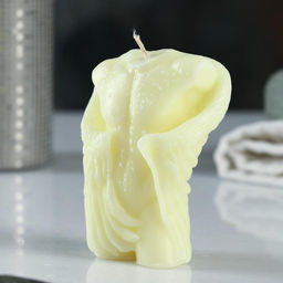 Фигурная свеча "Торс мужской с крыльями" молочная, 10см