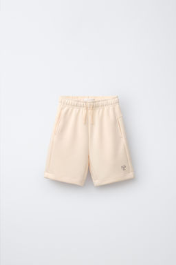 BERMUDA TEXTO SPORTY / Mandarina
