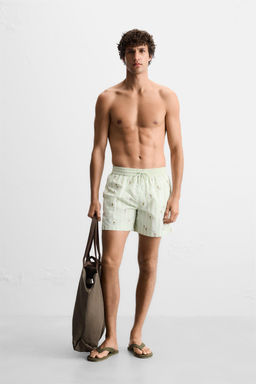 EMBROIDERED MID-LENGTH SWIMMING TRUNKS